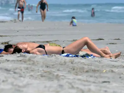 Olivia Wilde Takes a Dip in the Atlantic: A Relaxing Day in Wilmington, North Carolina